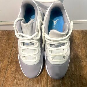 Gray and White Sneakers with Blue Accents